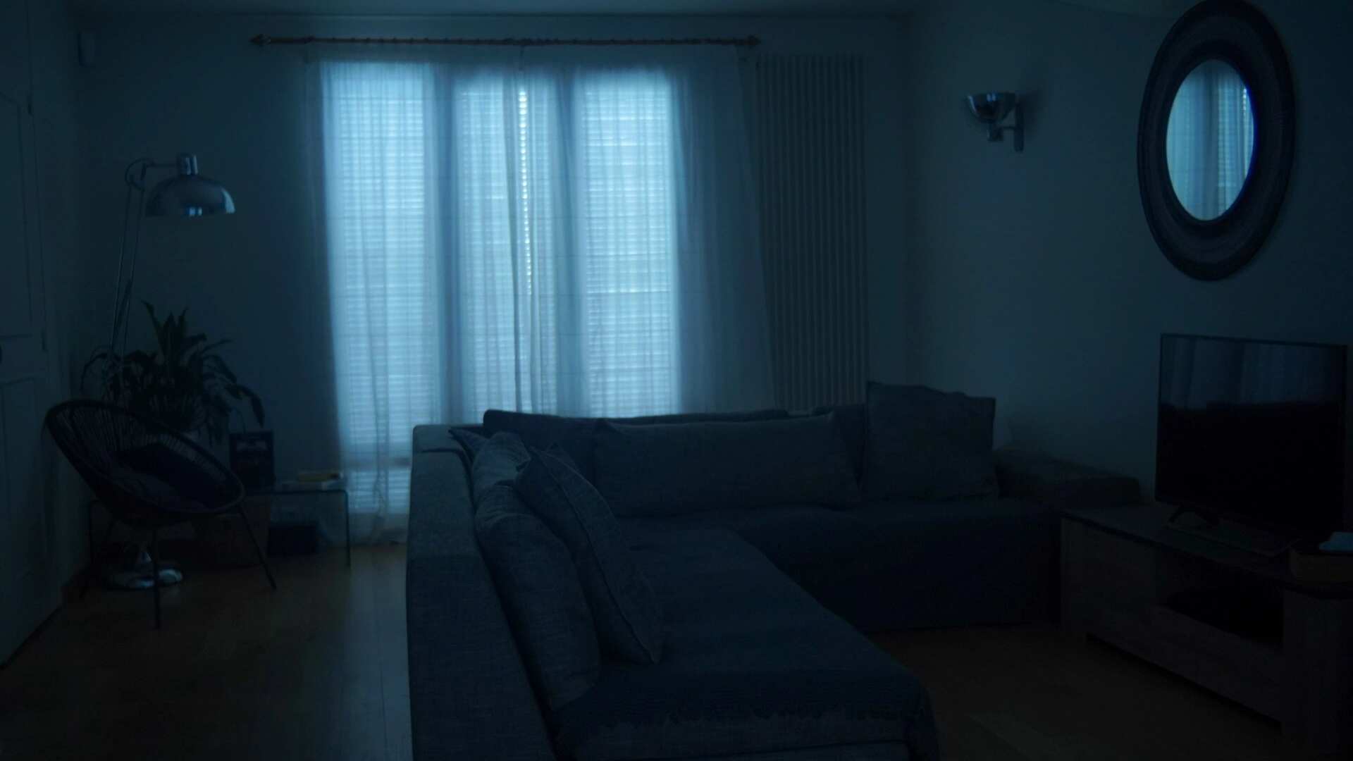 Interior with window bloom — cool blue atmosphere