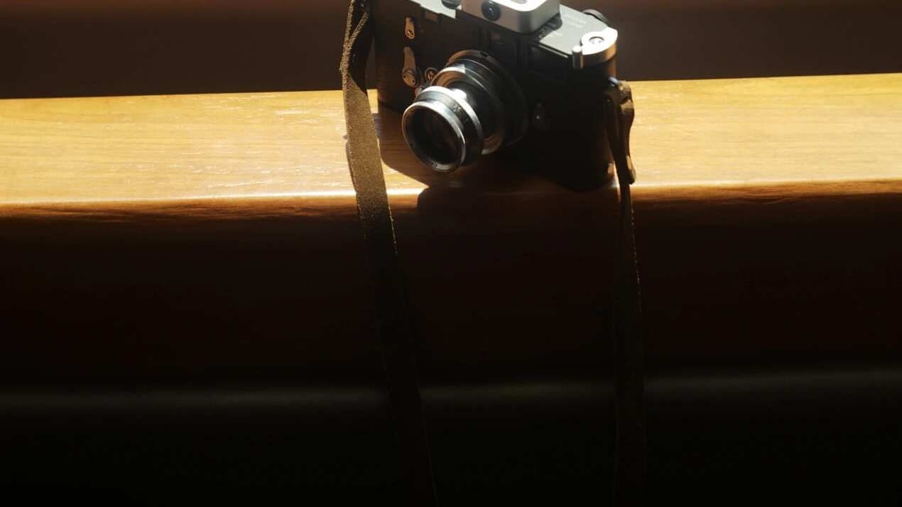 Leica with Summarit 50mm f/1.5 on a sunlit windowsill
